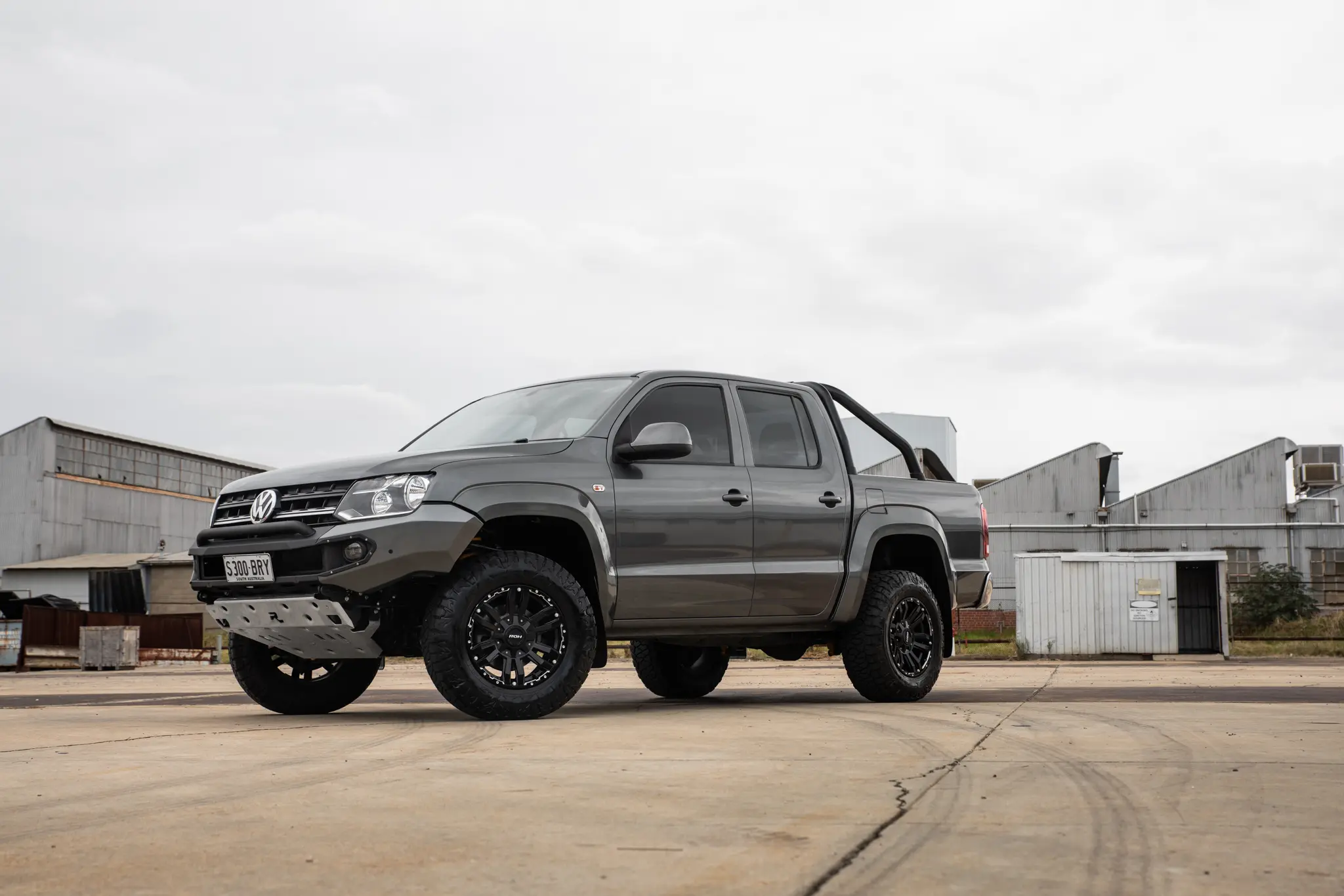 Volkswagen Amarok with 17x9 +30 ROH Vapour Matte Black Machined Accents Wheel in industrial area