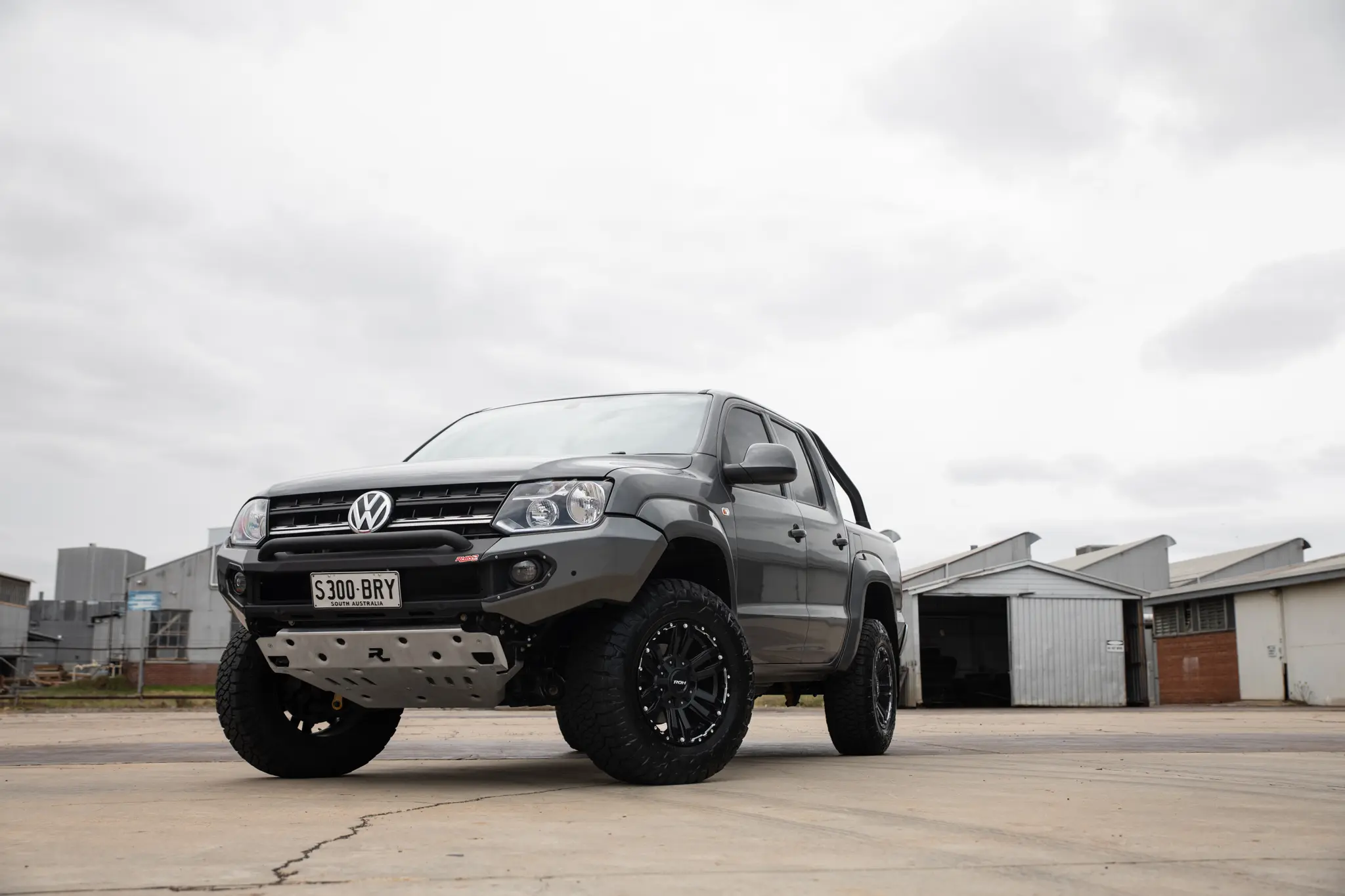 Volkswagen Amarok with 17x9 +30 ROH Vapour Matte Black Machined Accents Wheel in industrial area