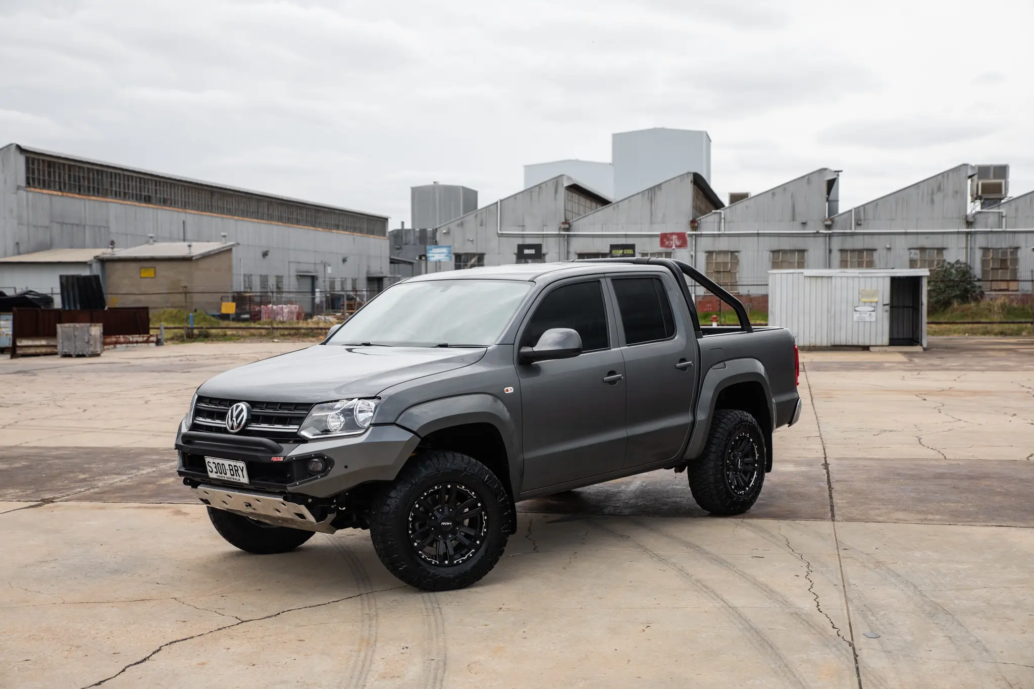 Volkswagen Amarok with 17x9 +30 ROH Vapour Matte Black Machined Accents Wheel in industrial area