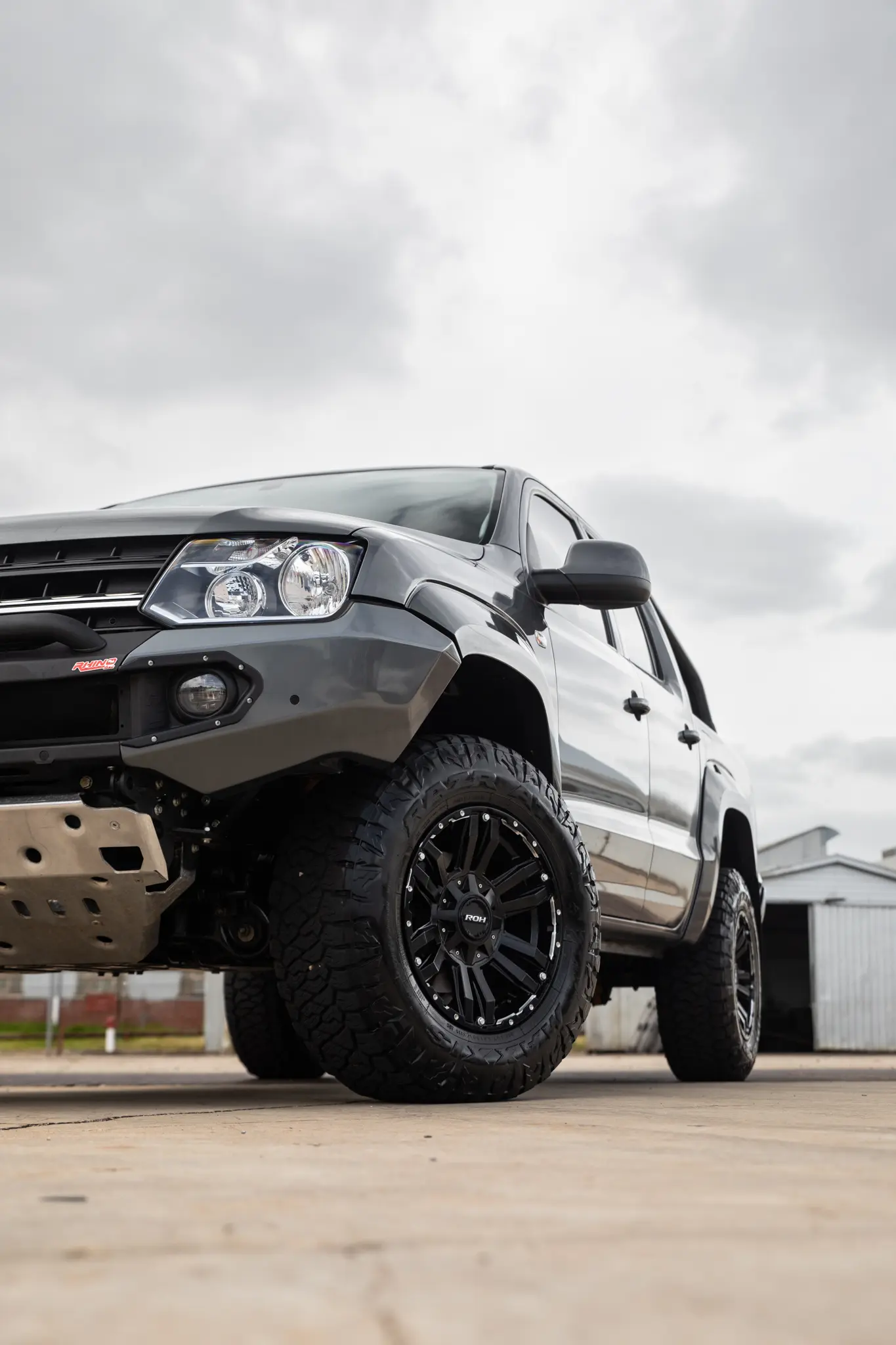 Volkswagen Amarok with 17x9 +30 ROH Vapour Matte Black Machined Accents Wheel in industrial area