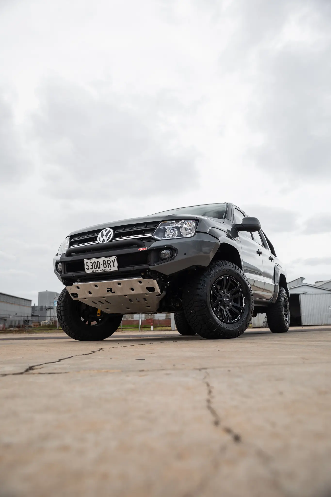 Volkswagen Amarok with 17x9 +30 ROH Vapour Matte Black Machined Accents Wheel in industrial area