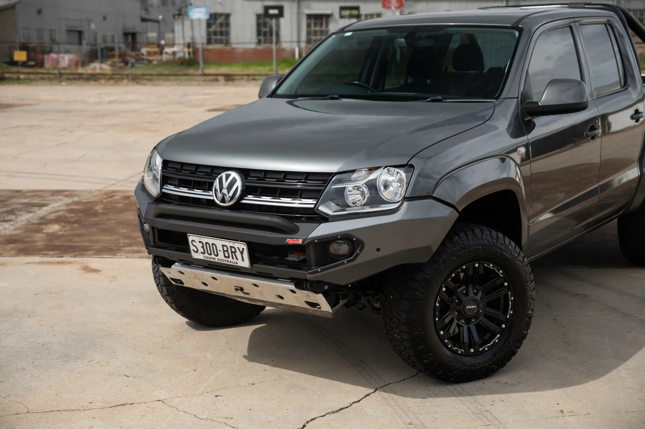 Volkswagen Amarok with 17x9 +30 ROH Vapour Matte Black Machined Accents Wheel in industrial area