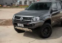 Volkswagen Amarok with 17x9 +30 ROH Vapour Matte Black Machined Accents Wheel in industrial area
