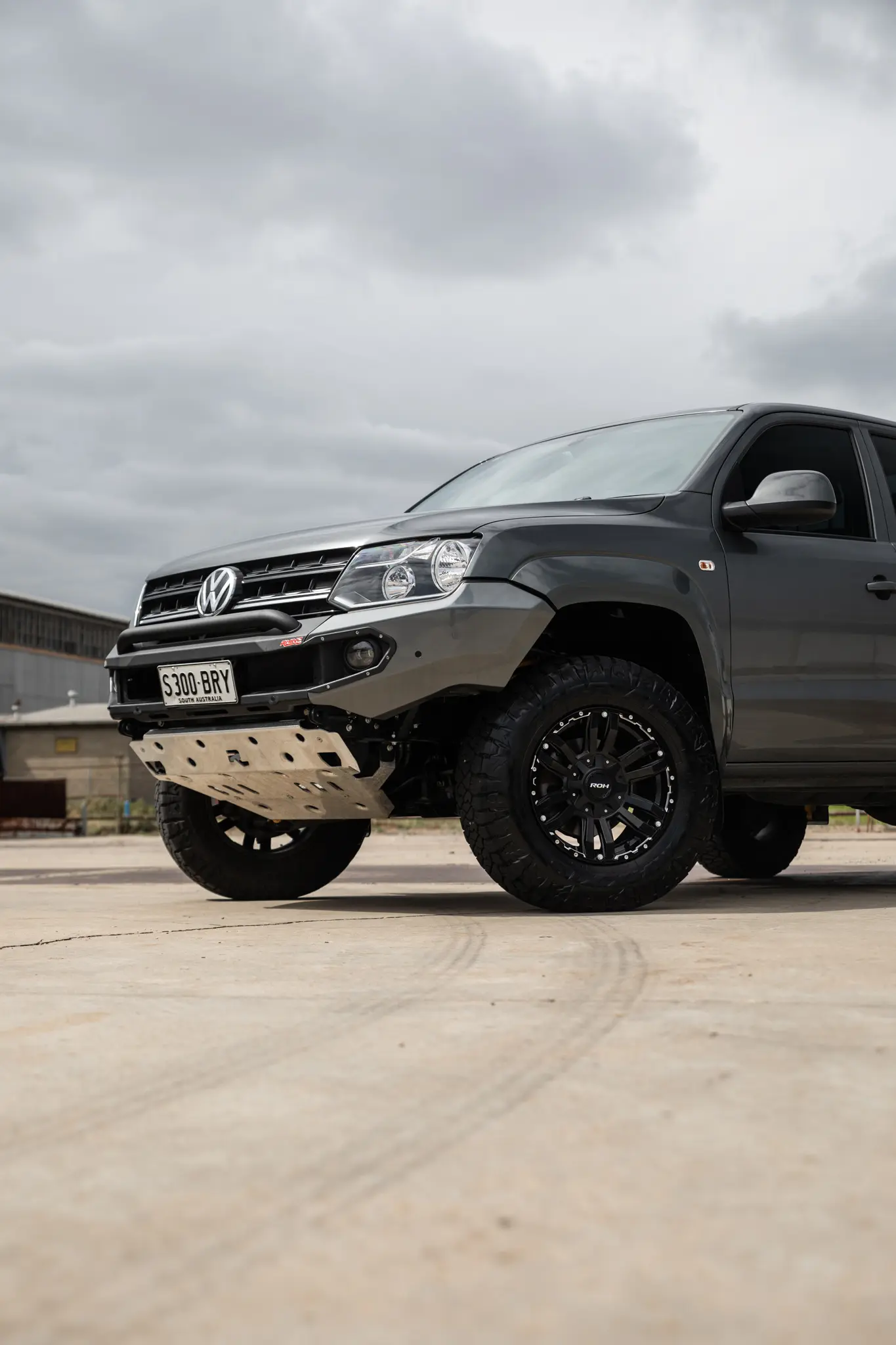 Volkswagen Amarok with 17x9 +30 ROH Vapour Matte Black Machined Accents Wheel in industrial area