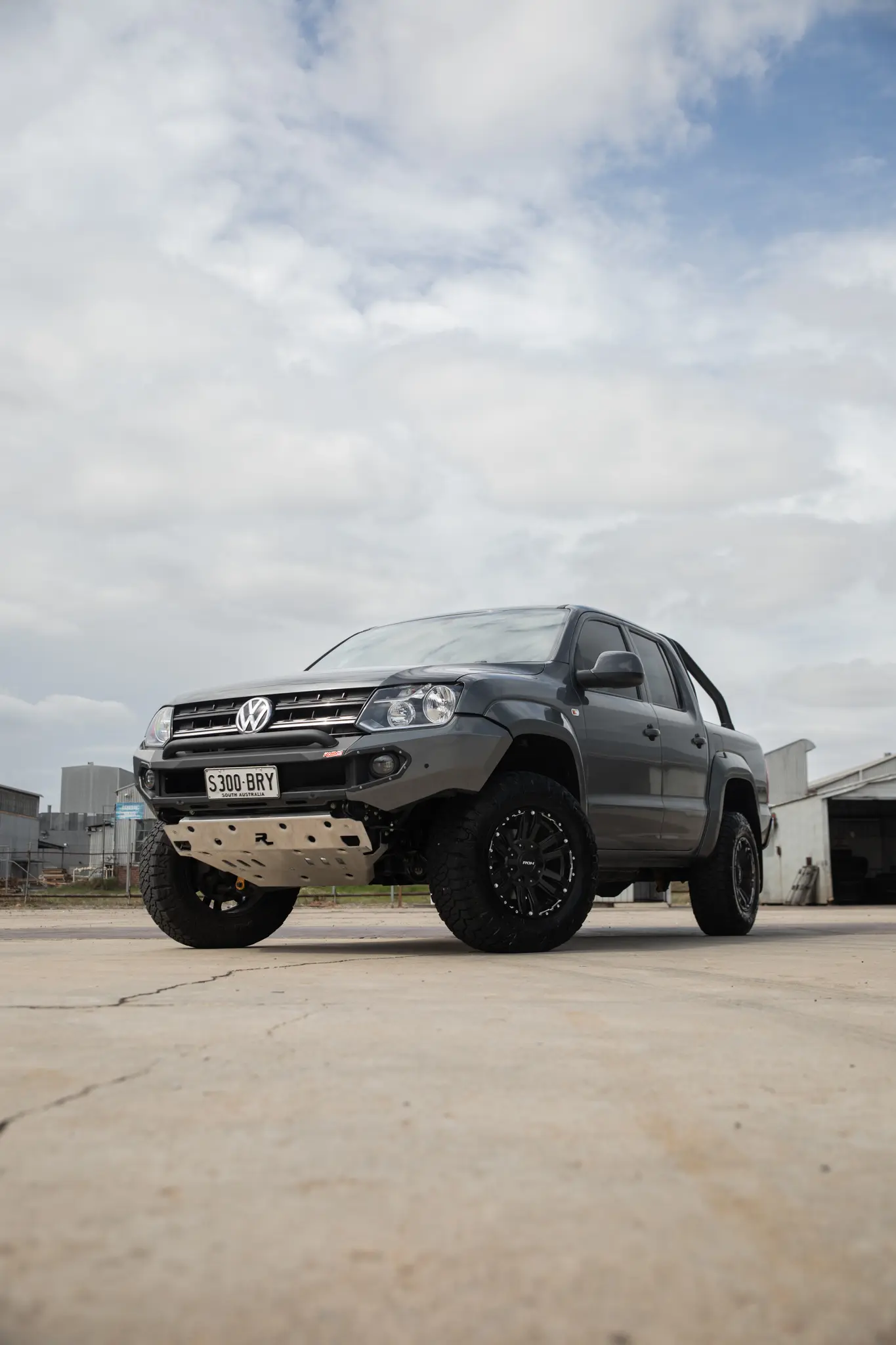 Volkswagen Amarok with 17x9 +30 ROH Vapour Matte Black Machined Accents Wheel in industrial area
