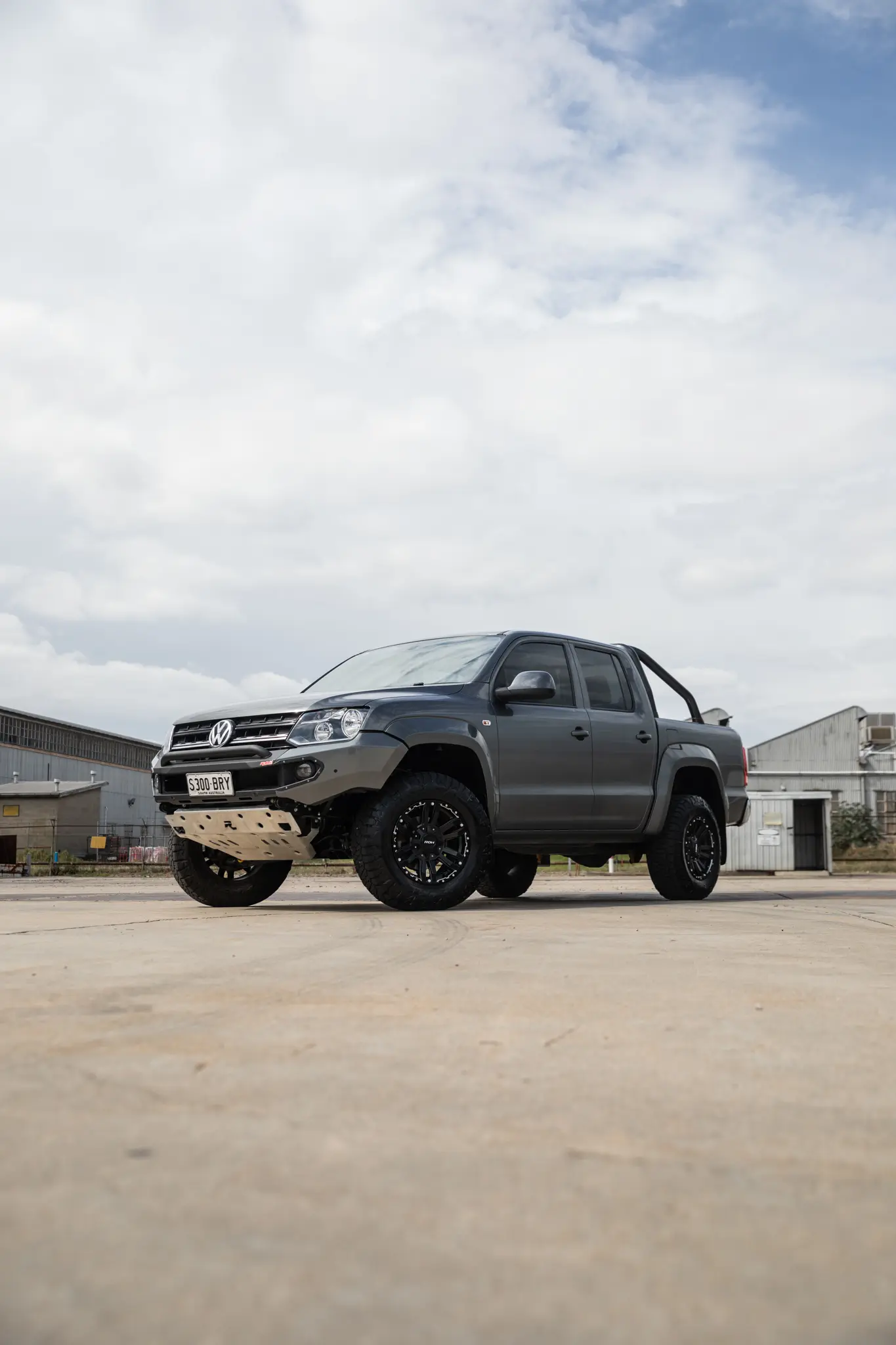 Volkswagen Amarok with 17x9 +30 ROH Vapour Matte Black Machined Accents Wheel in industrial area