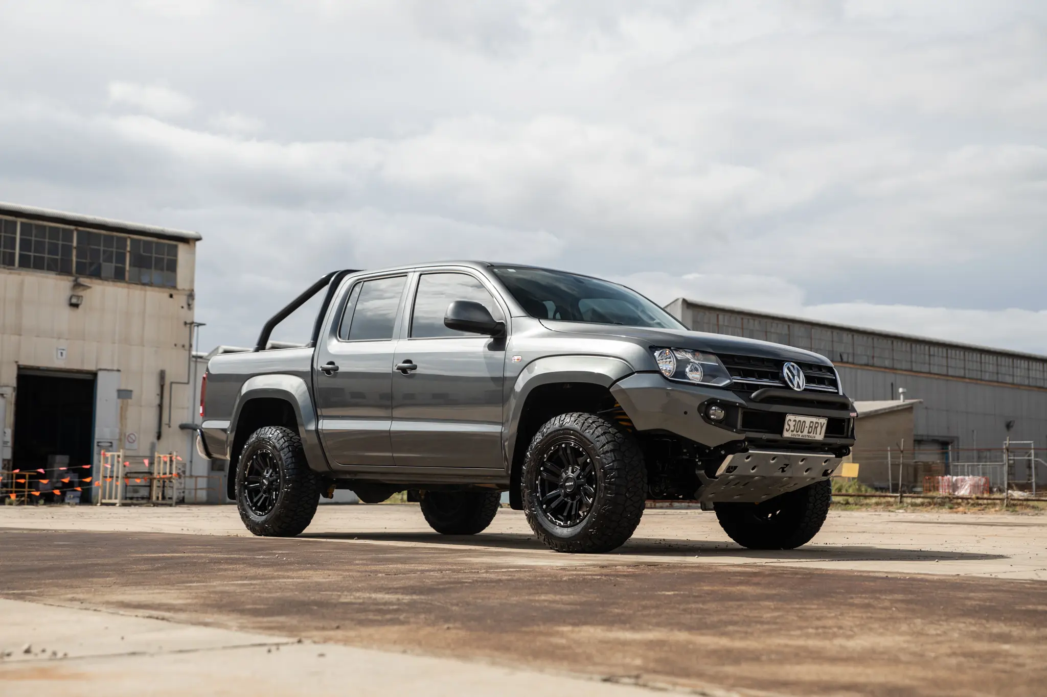 Volkswagen Amarok with 17x9 +30 ROH Vapour Matte Black Machined Accents Wheel in industrial area