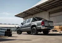 Volkswagen Amarok with 17x9 +30 ROH Vapour Matte Black Machined Accents Wheel in industrial area