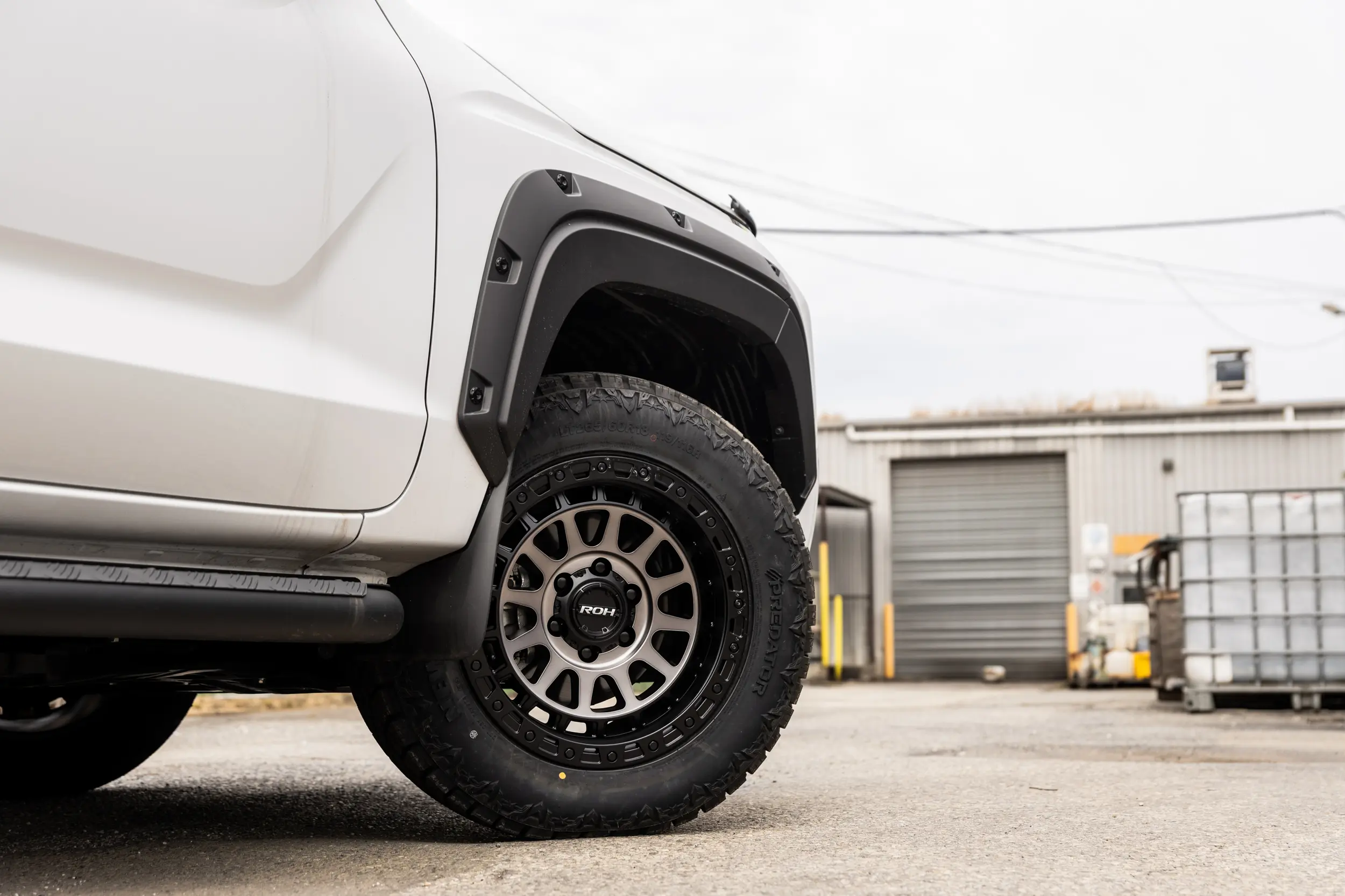 Mitsubishi Triton MV GSR with ROH Assault Graphite Centre Black Lip 4x4 Wheel in industrial area