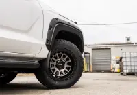 Mitsubishi Triton MV GSR with ROH Assault Graphite Centre Black Lip 4x4 Wheel in industrial area