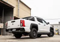 Mitsubishi Triton MV GSR with ROH Assault Graphite Centre Black Lip 4x4 Wheel in industrial area