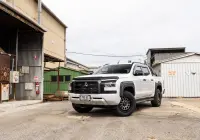 Mitsubishi Triton MV GSR with ROH Assault Graphite Centre Black Lip 4x4 Wheel in industrial area