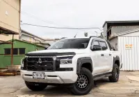 Mitsubishi Triton MV GSR with ROH Assault Graphite Centre Black Lip 4x4 Wheel in industrial area