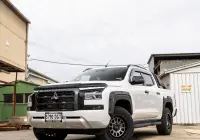 Mitsubishi Triton MV GSR with ROH Assault Graphite Centre Black Lip 4x4 Wheel in industrial area