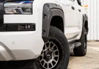 Mitsubishi Triton MV GSR with ROH Assault Graphite Centre Black Lip 4x4 Wheel in industrial area