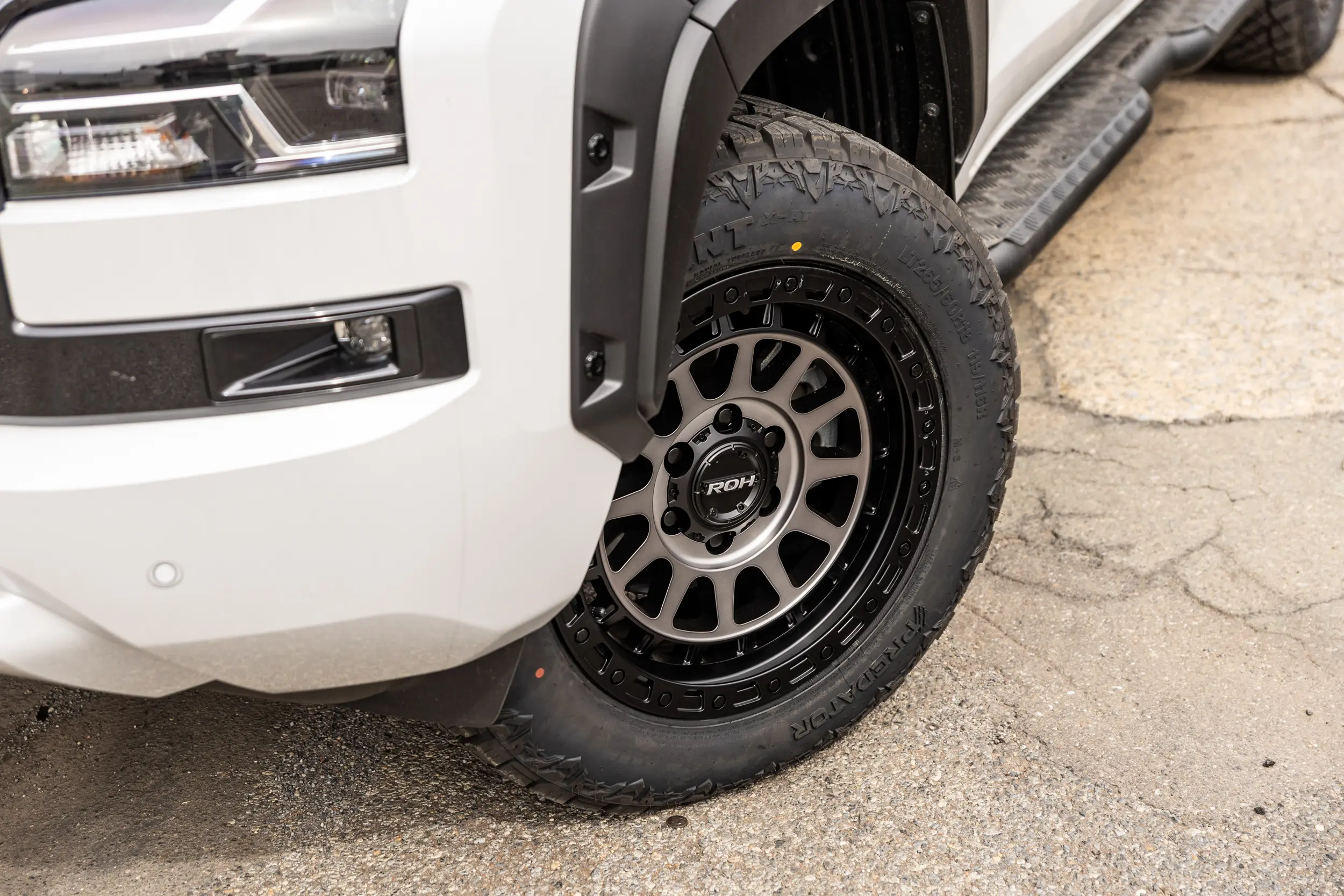 Mitsubishi Triton MV GSR with ROH Assault Graphite Centre Black Lip 4x4 Wheel in industrial area