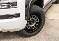 Mitsubishi Triton MV GSR with ROH Assault Graphite Centre Black Lip 4x4 Wheel in industrial area
