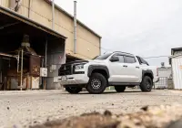 Mitsubishi Triton MV GSR with ROH Assault Graphite Centre Black Lip 4x4 Wheel in industrial area