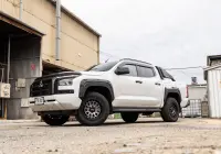 Mitsubishi Triton MV GSR with ROH Assault Graphite Centre Black Lip 4x4 Wheel in industrial area