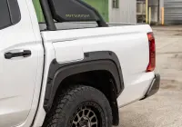 Mitsubishi Triton MV GSR with ROH Assault Graphite Centre Black Lip 4x4 Wheel in industrial area