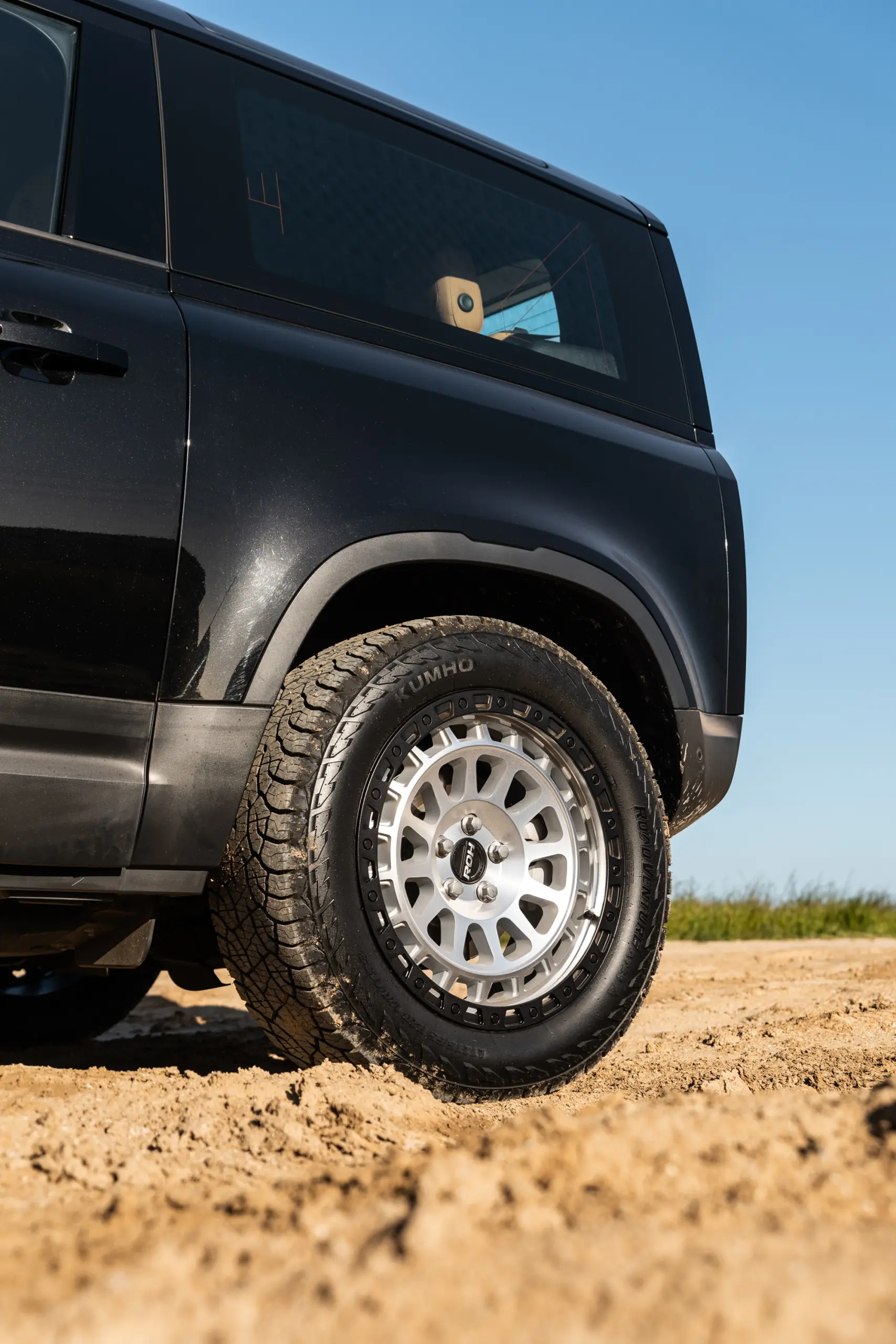 Black Land Rover Defender 90 with 20x9 +22 5x120 Machined Centre Black Lip ROH Assault Wheels