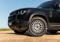 Black Land Rover Defender 90 with 20x9 +22 5x120 Machined Centre Black Lip ROH Assault Wheels