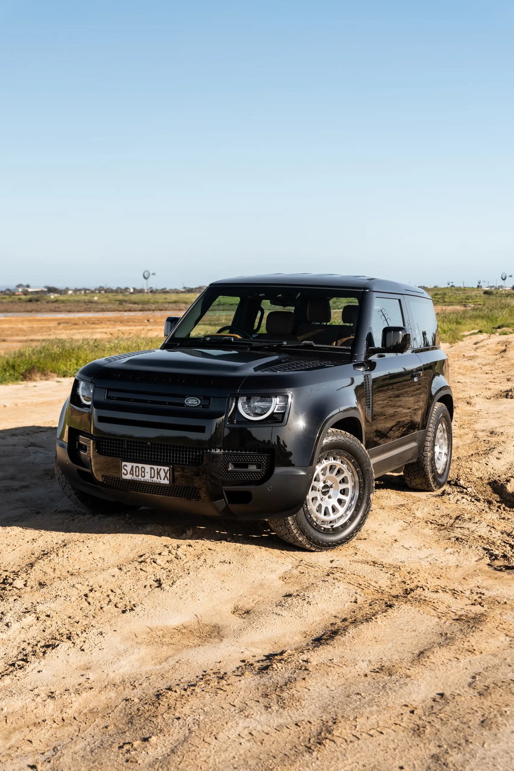 Black Land Rover Defender 90 with 20x9 +22 5x120 Machined Centre Black Lip ROH Assault Wheels