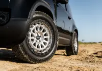 Black Land Rover Defender 90 with 20x9 +22 5x120 Machined Centre Black Lip ROH Assault Wheels