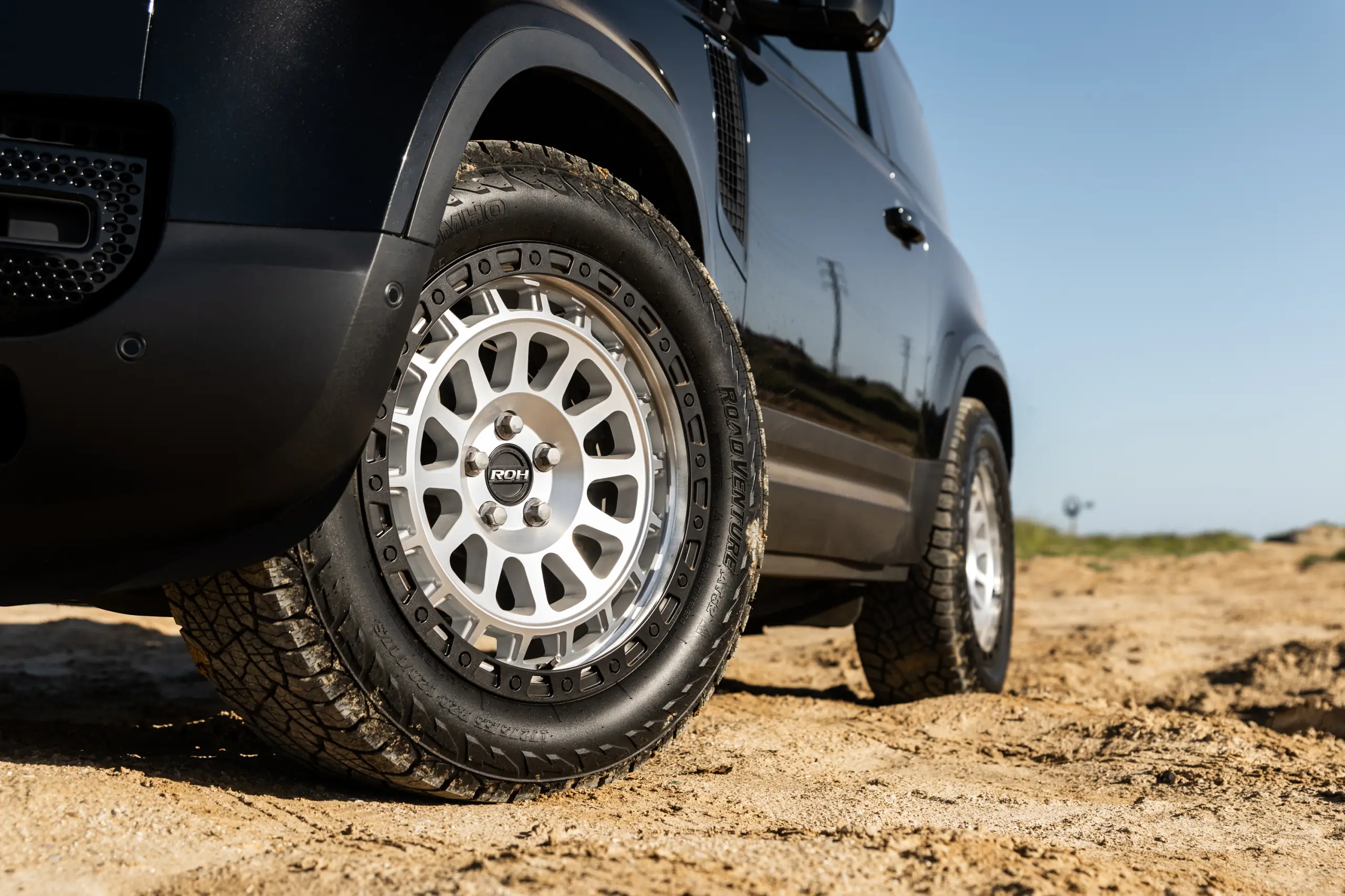 Black Land Rover Defender 90 with 20x9 +22 5x120 Machined Centre Black Lip ROH Assault Wheels