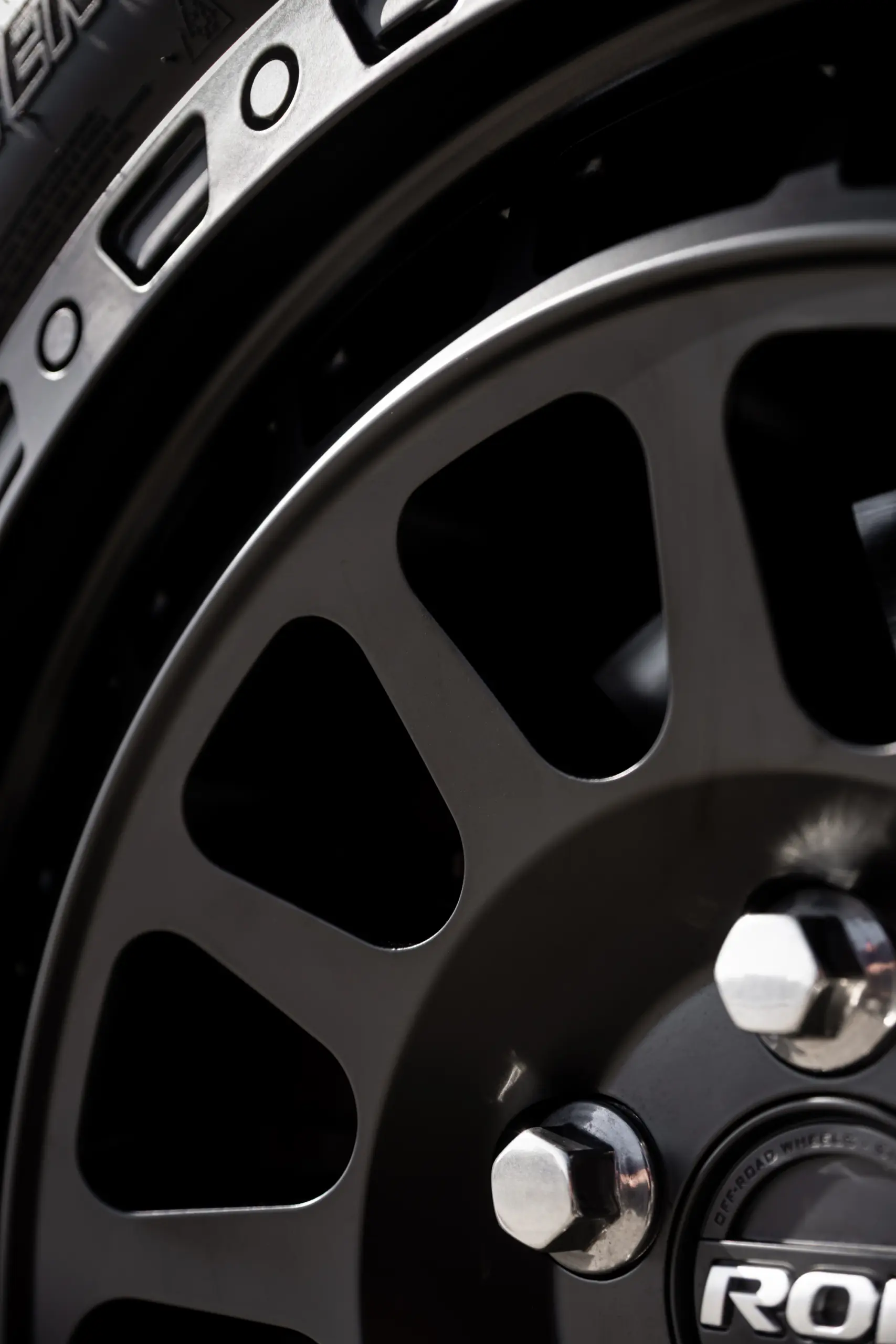 Black Land Rover Defender 90 with 20x9 +22 5x120 Matte Black ROH Assault Wheels at dockyard