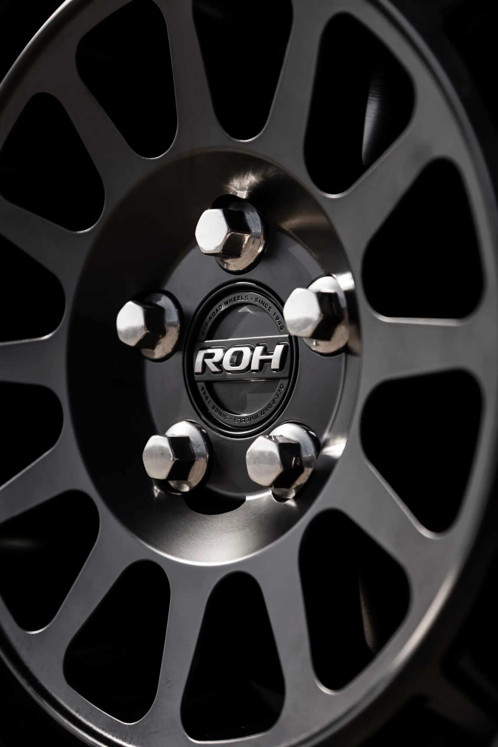 Black Land Rover Defender 90 with 20x9 +22 5x120 Matte Black ROH Assault Wheels at dockyard