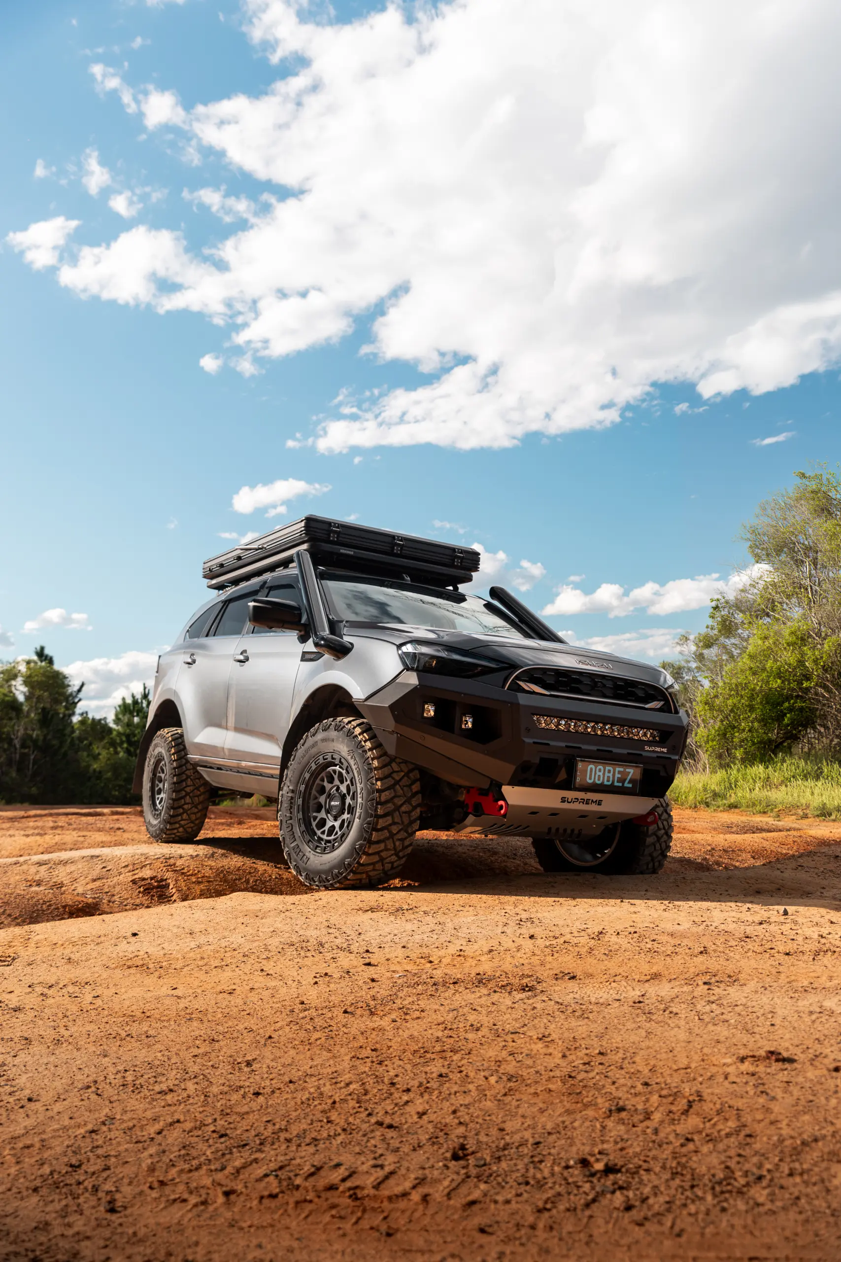 Grey Isuzu MU-X with ROH Atlas 4x4 Wheel in Graphite Centre Black Lip finish off road