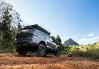 Grey Isuzu MU-X with ROH Atlas 4x4 Wheel in Graphite Centre Black Lip finish off road
