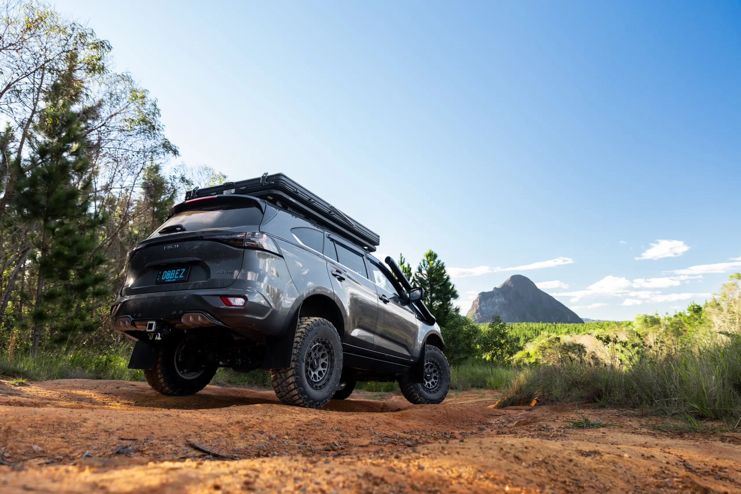 Grey Isuzu MU-X with ROH Atlas 4x4 Wheel in Graphite Centre Black Lip finish off road