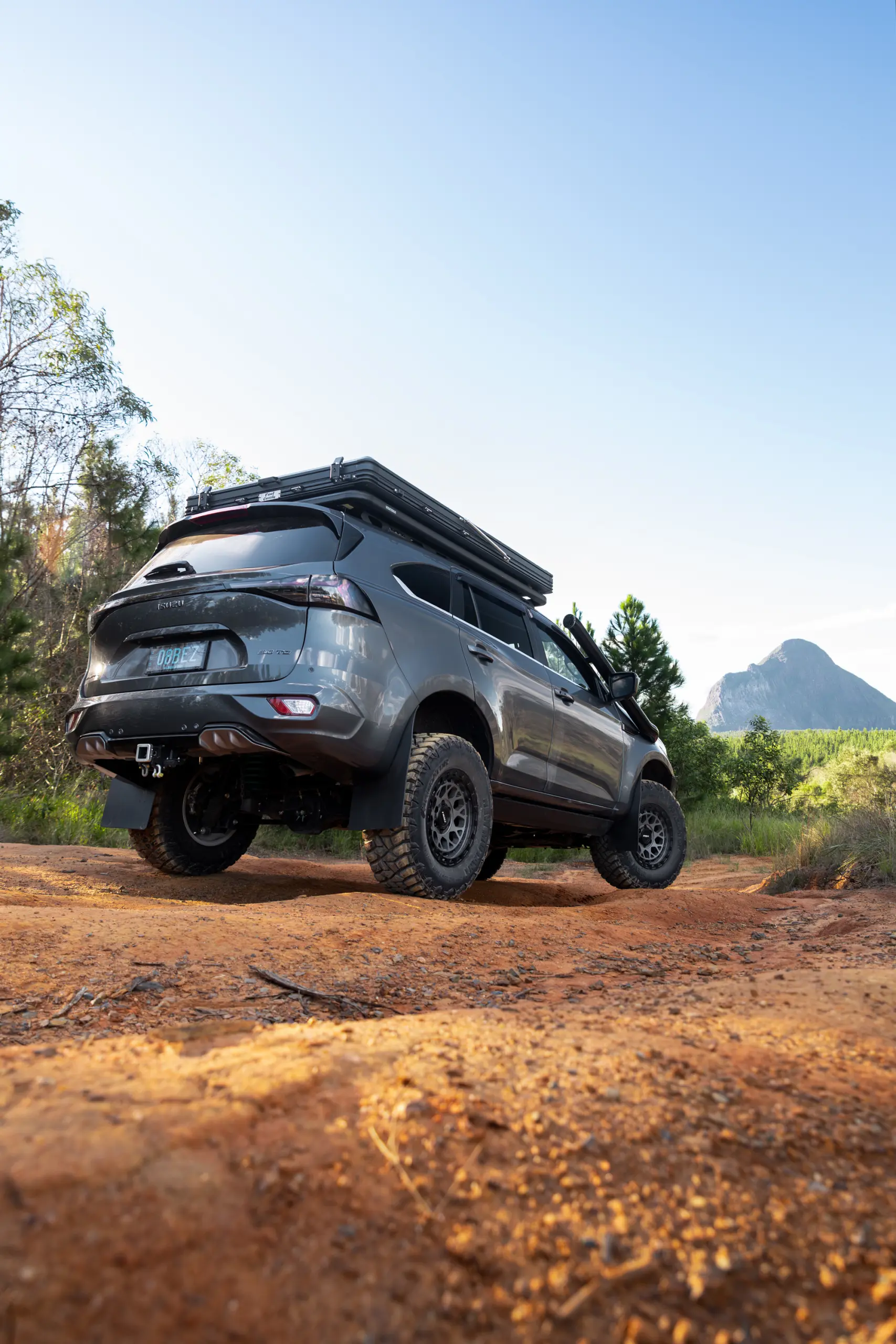 Grey Isuzu MU-X with ROH Atlas 4x4 Wheel in Graphite Centre Black Lip finish off road