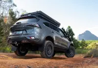 Grey Isuzu MU-X with ROH Atlas 4x4 Wheel in Graphite Centre Black Lip finish off road