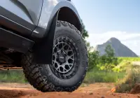 Grey Isuzu MU-X with ROH Atlas 4x4 Wheel in Graphite Centre Black Lip finish off road