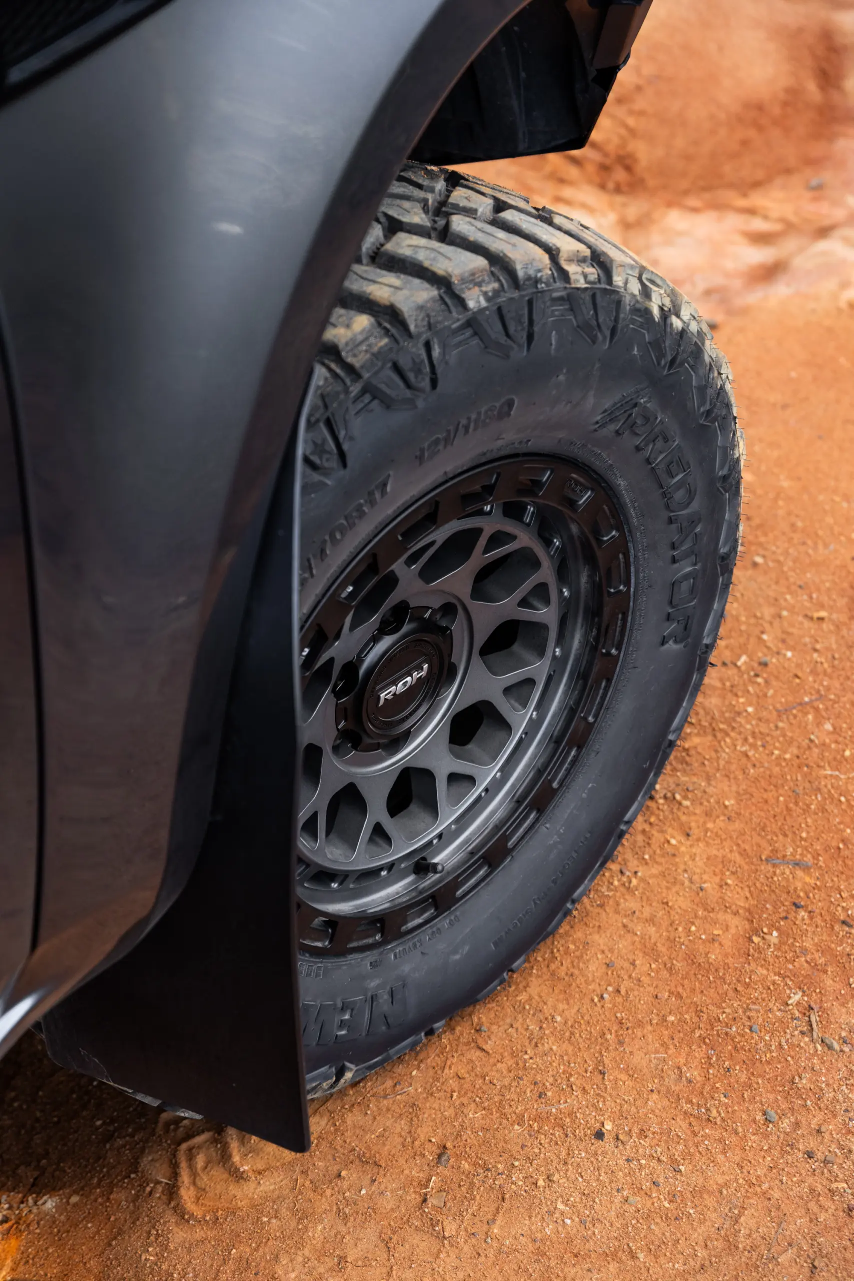 Grey Isuzu MU-X with ROH Atlas 4x4 Wheel in Graphite Centre Black Lip finish off road