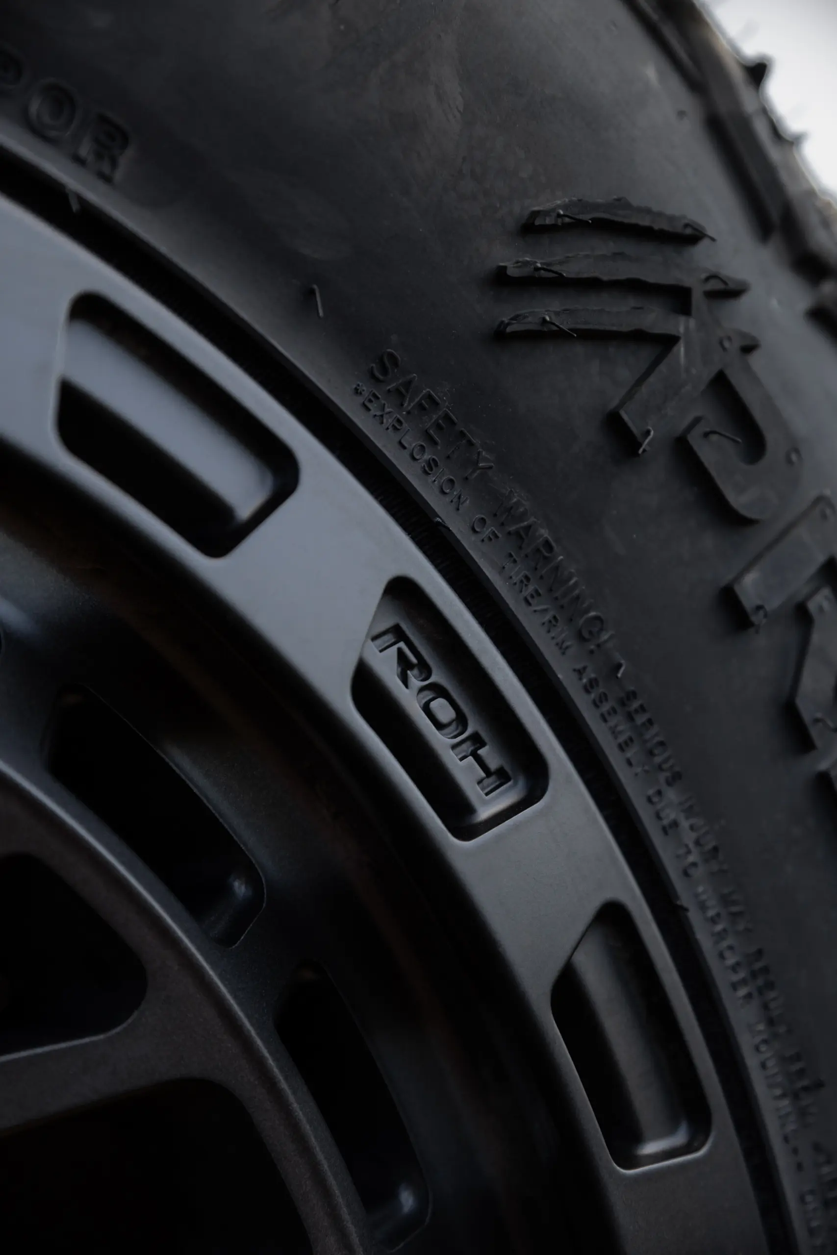 Close-up of ROH Logo on Atlas 4x4 Wheel in Graphite Centre Black Lip finish