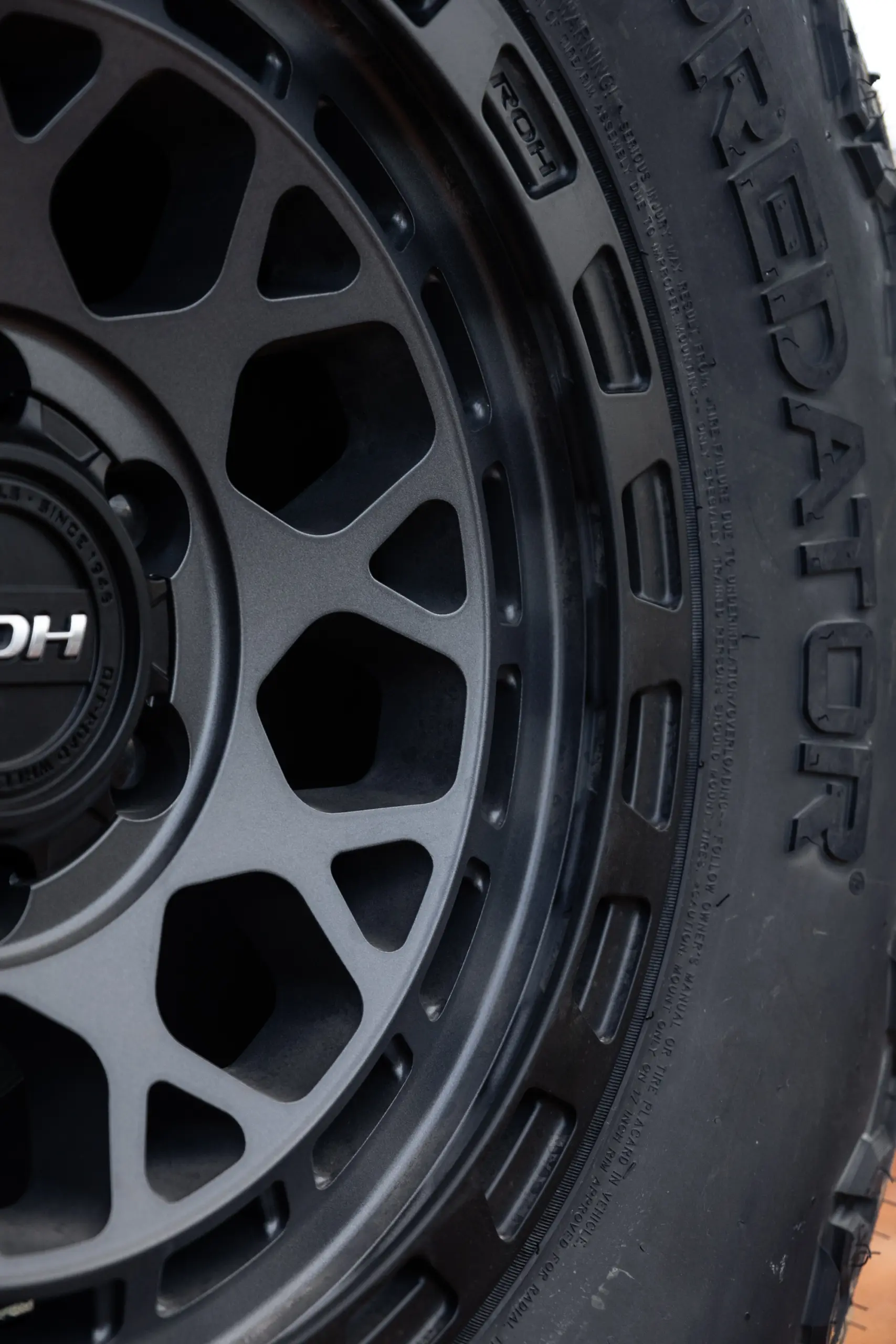 Close-up of ROH Atlas 4x4 Wheel in Graphite Centre Black Lip finish
