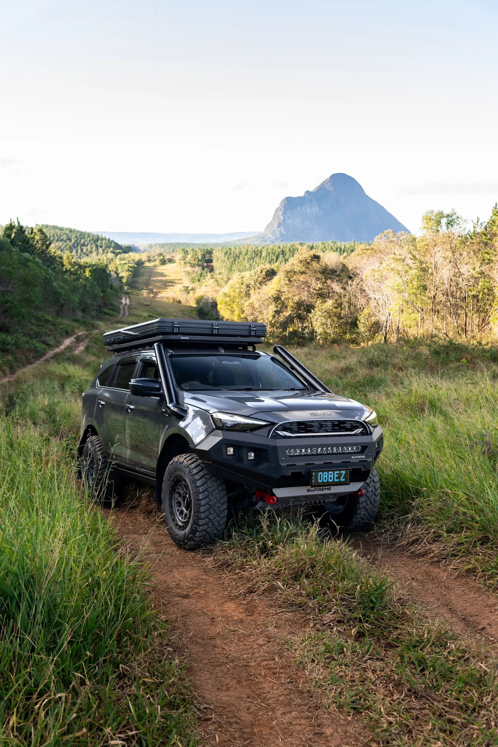 Grey Isuzu MU-X with ROH Atlas 4x4 Wheel in Graphite Centre Black Lip finish off road
