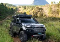 Grey Isuzu MU-X with ROH Atlas 4x4 Wheel in Graphite Centre Black Lip finish off road