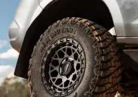 Grey Isuzu MU-X with ROH Atlas 4x4 Wheel in Graphite Centre Black Lip finish off road