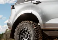 Grey Isuzu MU-X with ROH Atlas 4x4 Wheel in Graphite Centre Black Lip finish off road