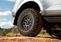 Grey Isuzu MU-X with ROH Atlas 4x4 Wheel in Graphite Centre Black Lip finish off road