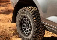 Grey Isuzu MU-X with ROH Atlas 4x4 Wheel in Graphite Centre Black Lip finish off road