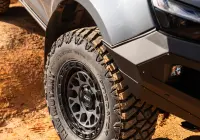 Grey Isuzu MU-X with ROH Atlas 4x4 Wheel in Graphite Centre Black Lip finish off road