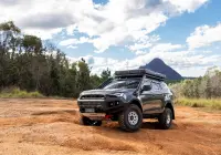 Grey Isuzu MU-X with ROH Atlas 4x4 Wheel in Machined Centre Black Lip finish off road