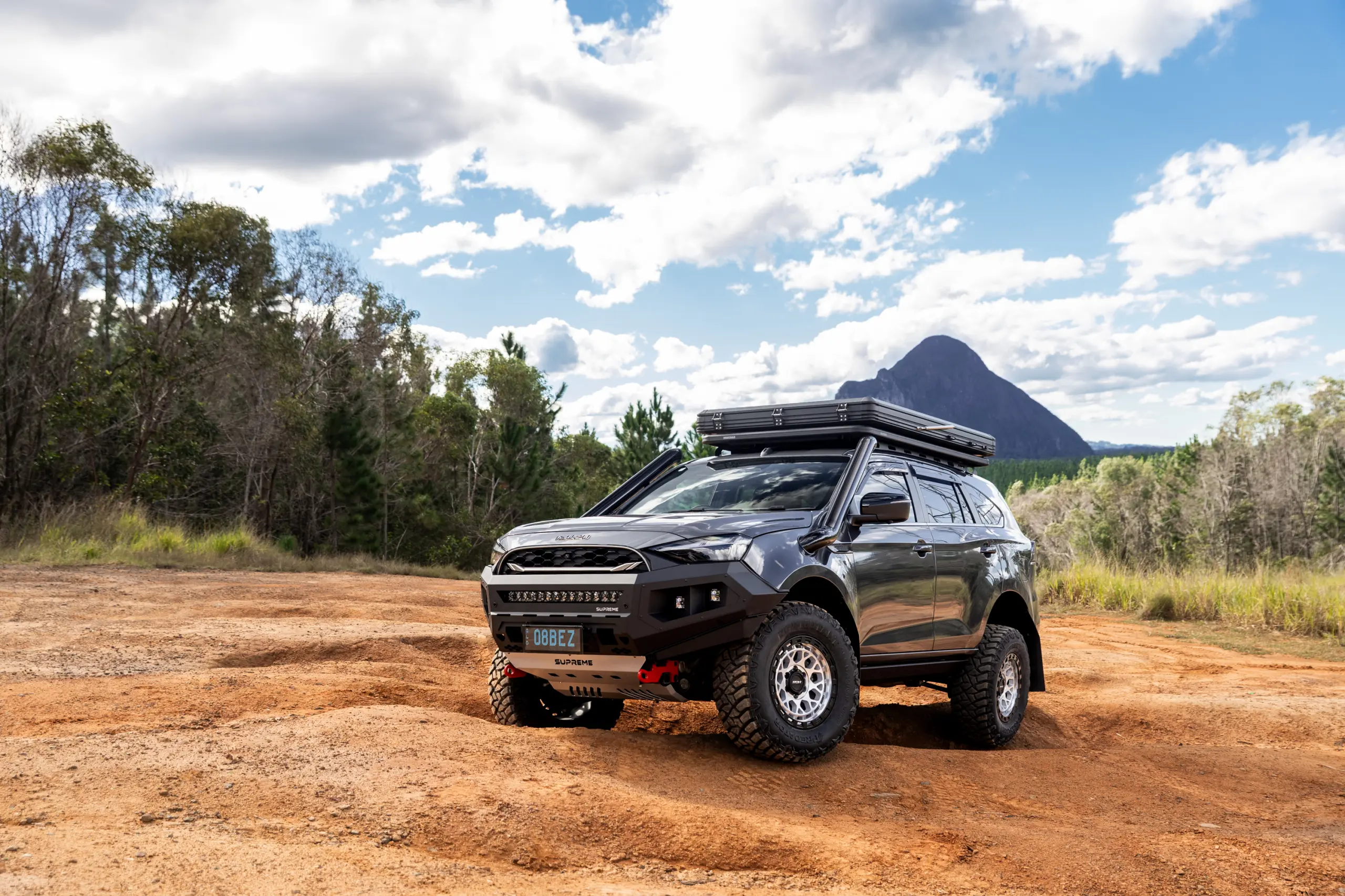 Grey Isuzu MU-X with ROH Atlas 4x4 Wheel in Machined Centre Black Lip finish off road