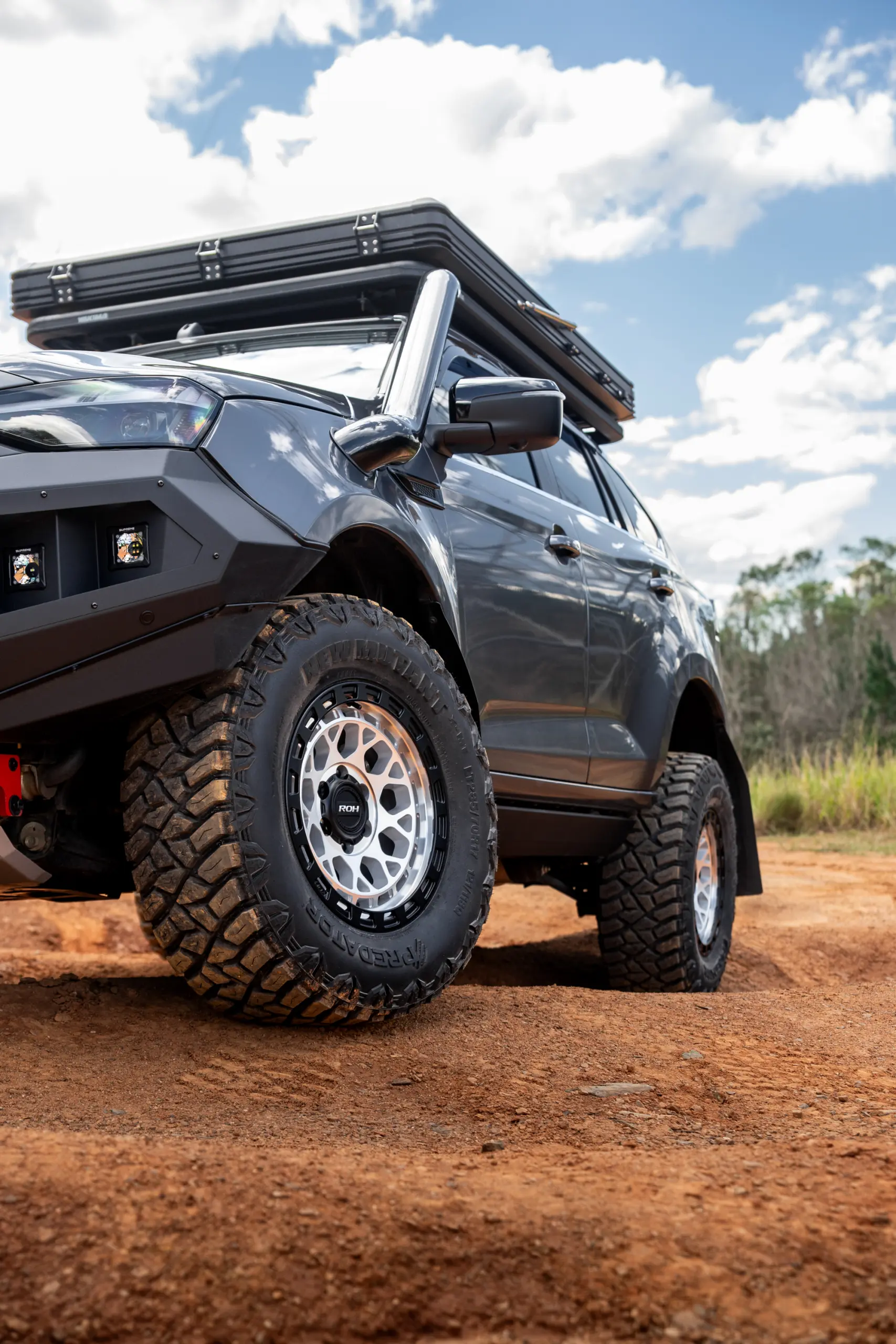 Grey Isuzu MU-X with ROH Atlas 4x4 Wheel in Machined Centre Black Lip finish off road
